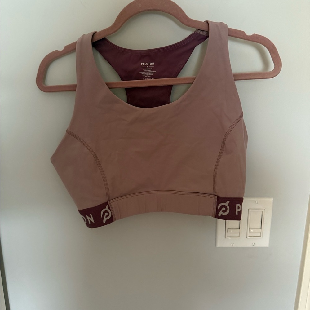 Peloton Cadent V-Back Bra in a mauve/pink color with a maroon inner lining - Picture 1 of 5